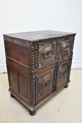 Lot 1150 - A Continental carved oak cupboard with a...