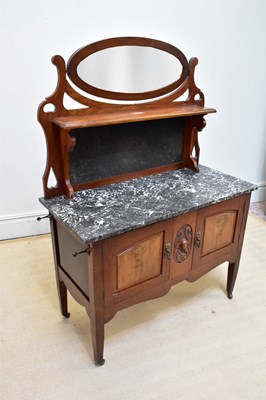 Lot 1132 - A late Victorian marble topped washstand with...
