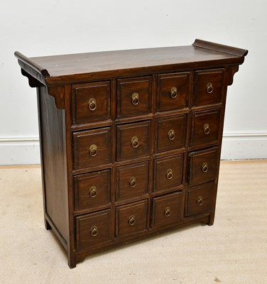 Lot 1191 - A modern Chinese chest of sixteen drawers,...