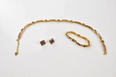 Lot 867 - SWAROVSKI; a gold tone metal necklace,...
