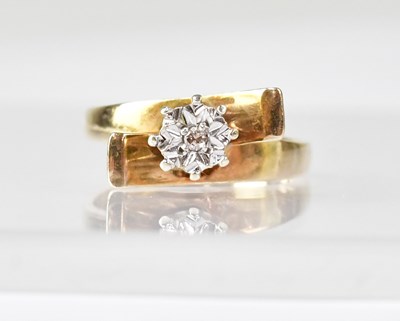 Lot 614 - A 1970s style 9ct gold illusion set solitaire...