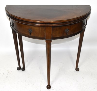 Lot 2468 - An early 20th century mahogany demi-lune fold...