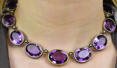 Lot 1054 - A fine Victorian yellow metal and amethyst...