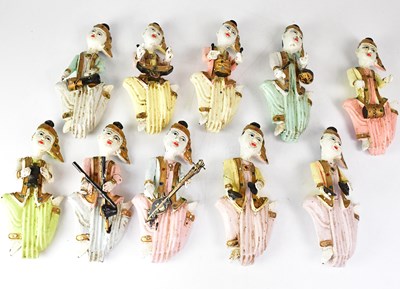 Lot 318 - Ten Indonesian carved wooden figures of...