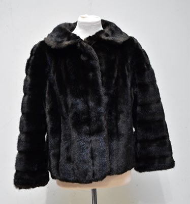 Lot 927 - A short dark brown vintage fully lined mink...