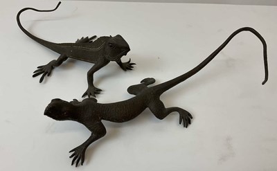 Lot 110 - A pair of decorative brass lizards styled as...