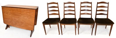 Lot 2567 - A mid-century teak drop leaf dining table,...