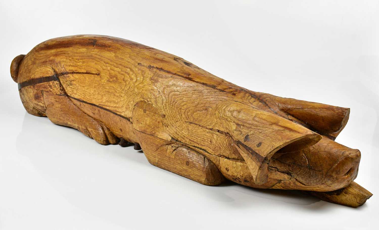 Lot 1149 - EDWARD 'TED' ROOCROFT (1918-1991); a large carved wooden sculpture in oak and yew, 'Pig el Greco Sow'.