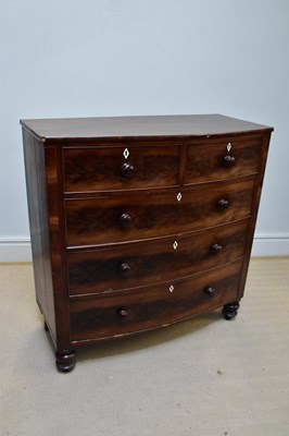 Lot 1058 - A 19th century mahogany bowfront chest of two...