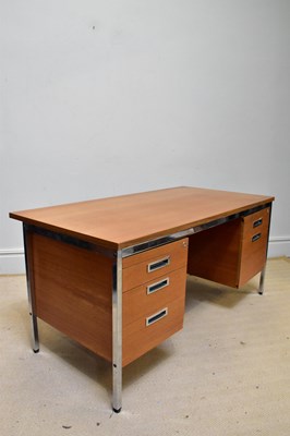 Lot 1219 - A mid century retro teak effect six drawer...