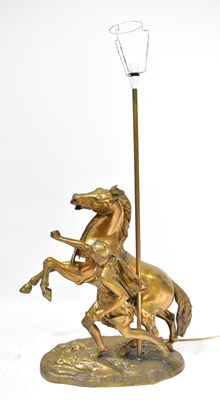 Lot 142 - A large gold painted spelter Marly horse lamp,...