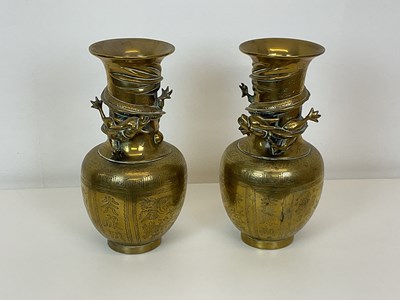 Lot 147 - A pair of late 19th century Chinese brass...