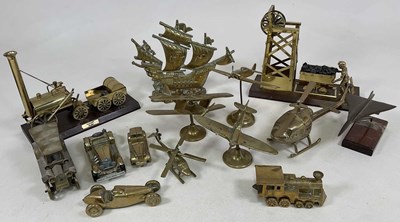 Lot 101 - A collection of transportation related brass...