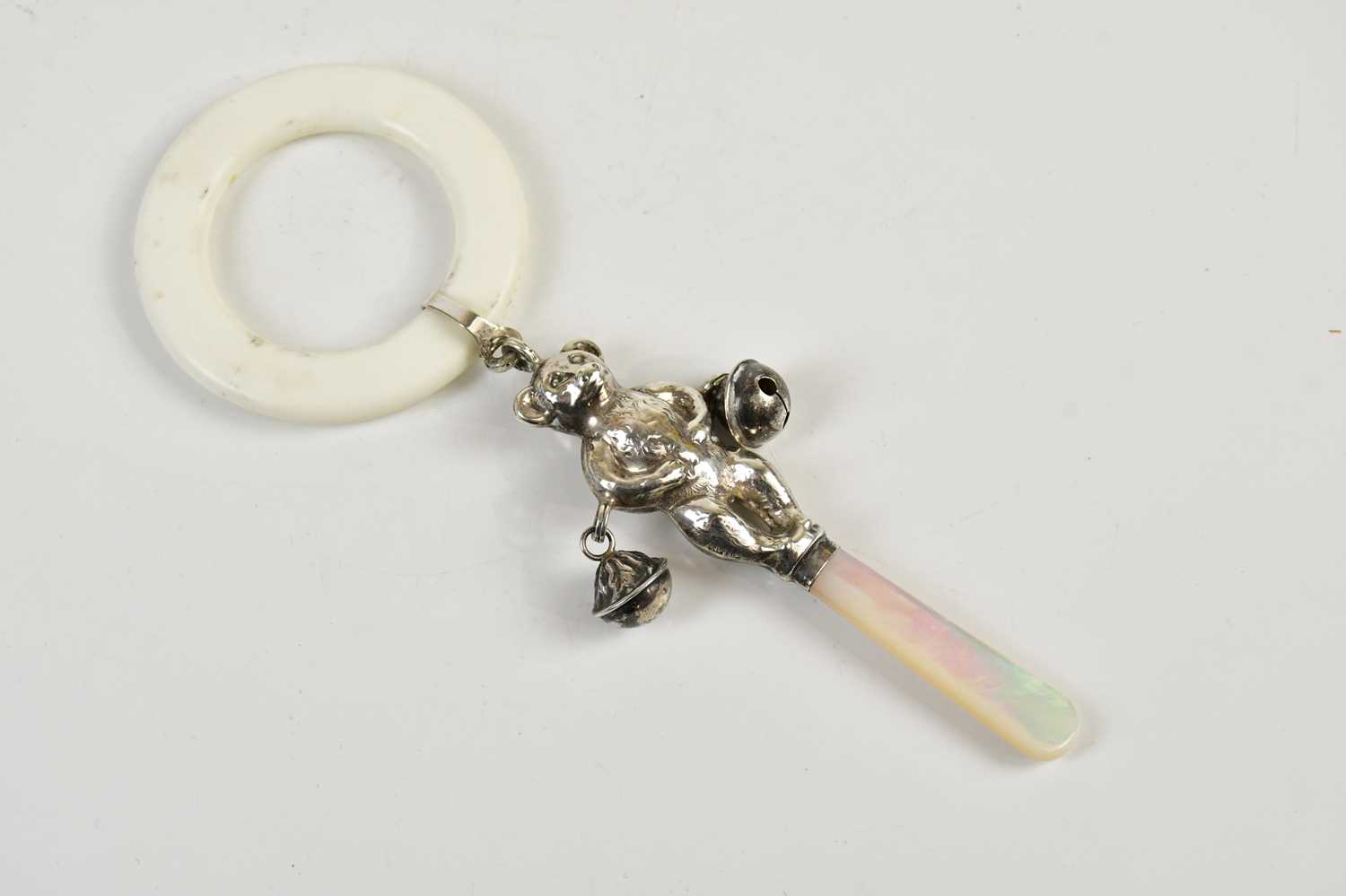 Lot 2515 - An Elizabeth II hallmarked silver baby rattle...