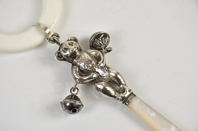Lot 2515 - An Elizabeth II hallmarked silver baby rattle...