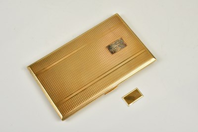 Lot 1 - A 9ct yellow gold cigarette case with engine...