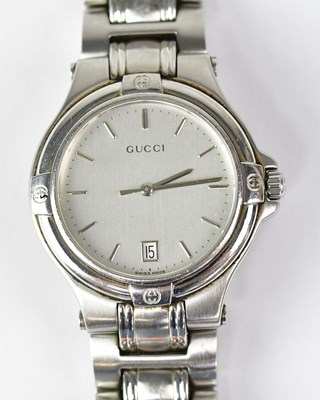 Lot 1312 - GUCCI; a 9040M gentlemen's quartz wristwatch,...