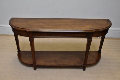 Lot 1202 - A reproduction oak serpentine front console...