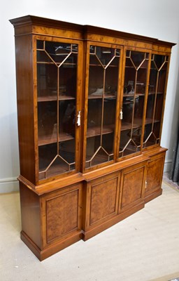 Lot 1171 - A reproduction yew wood breakfront display...