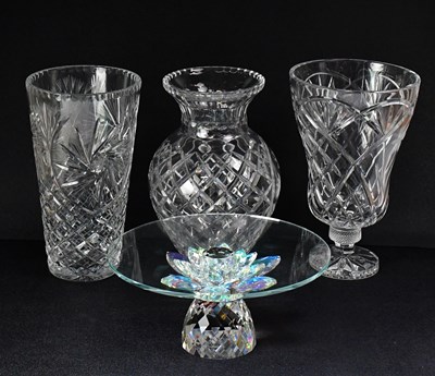 Lot 329 - Three large cut glass vases, comprising a...