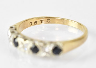Lot 1104 - A 9ct gold half eternity ring illusion set...