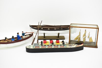 Lot 226 - A model Titanic lifeboat on stand, with oars,...