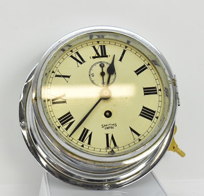 Lot 312 - A Smiths Empire chrome plate ship's clock, the...