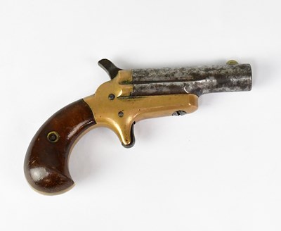 Lot 328 - COLT; a Derringer .41 RF brass framed pocket...