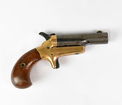 Lot 329 - COLT; a Derringer .41 RF brass framed pocket...