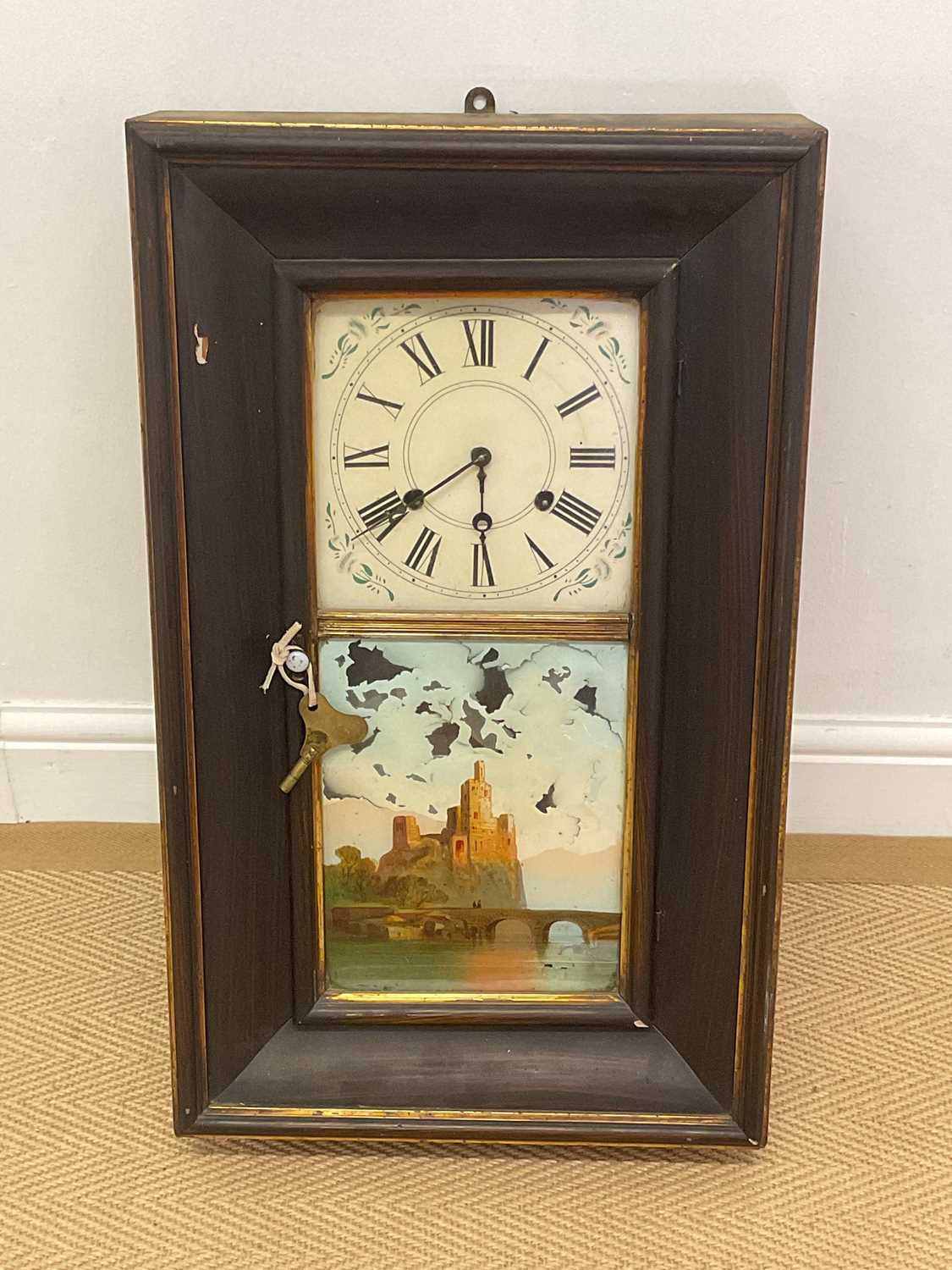 Lot 714 - An American rectangular wall clock, with