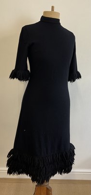 Lot 148 - A group of 1960s dresses including a black...