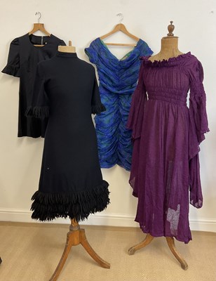 Lot 148 - A group of 1960s dresses including a black...