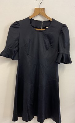 Lot 148 - A group of 1960s dresses including a black...