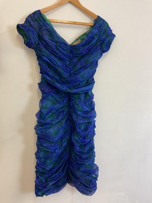 Lot 148 - A group of 1960s dresses including a black...