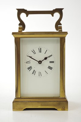 Lot 1353 - A French brass cased carriage clock, the...
