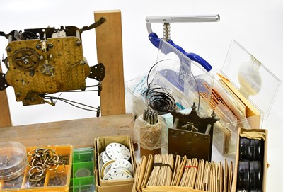 Lot 706 - A collection of pocket watch parts, tools,...