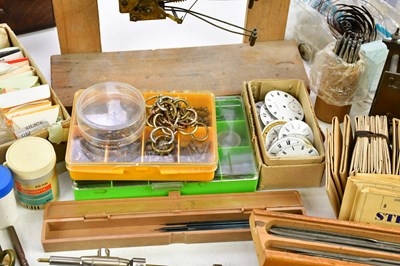 Lot 706 - A collection of pocket watch parts, tools,...