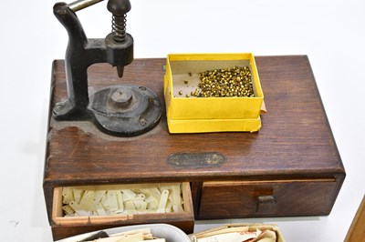 Lot 706 - A collection of pocket watch parts, tools,...