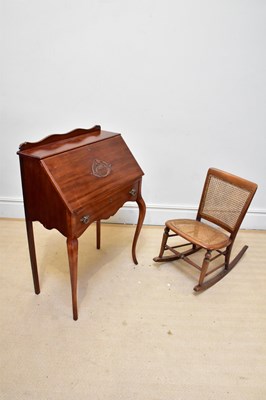 Lot 1116 - A stained lady's bureau with raised back, the...