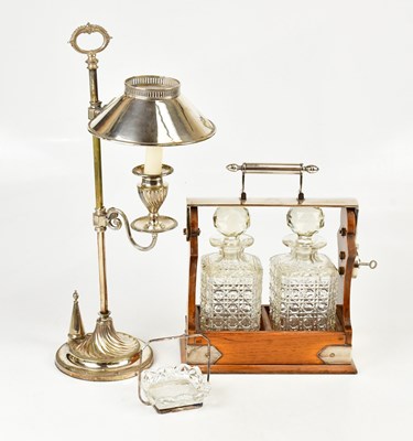 Lot 1420 - THE TANTALUS; a Betjemann's patent silver...