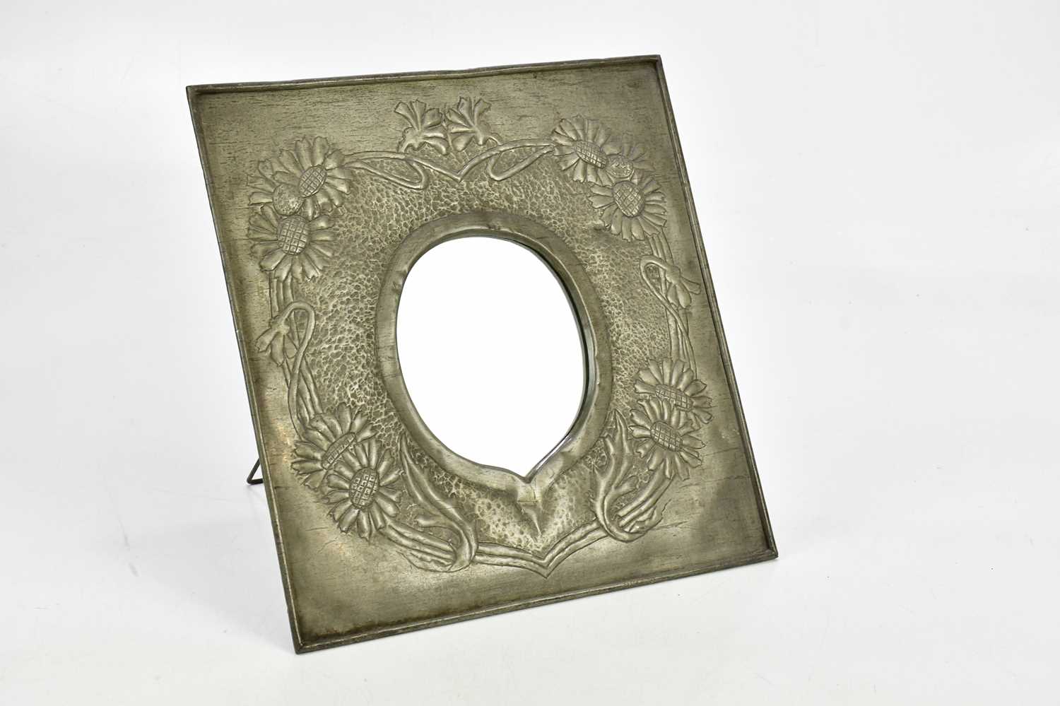 Lot 2780 - An Arts and Crafts style sheet metal easel...