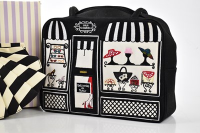 Lot 749 - LULU GUINNESS; a black cloth Hat Shop large...