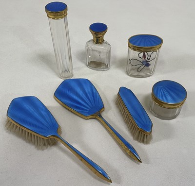 Lot 11 - A guilloche enamel and brass mid century...