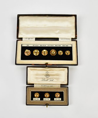 Lot 6 - A cased set of five yellow metal shirt studs...