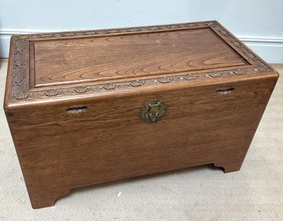 Lot 1187 - A Chinese carved camphor wood blanket chest of...