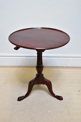 Lot 1117 - A Georgian mahogany tilt-top tripod table,...