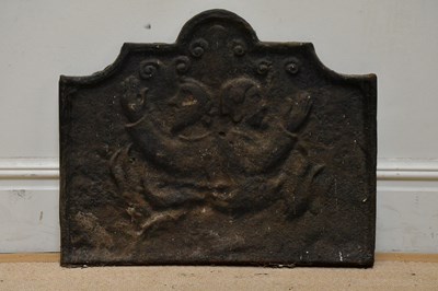 Lot 1272 - A 19th century cast iron fireback, relief...