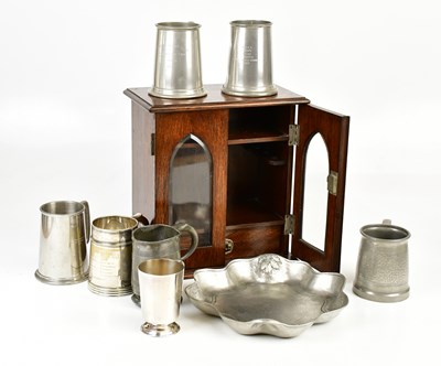 Lot 1424 - A 1920s oak two door smoker's cabinet in the...