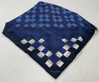 Lot 83 - CHANEL; a silk scarf with white floral design...