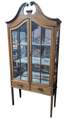 Lot 1053 - An Edwardian inlaid mahogany two door display...